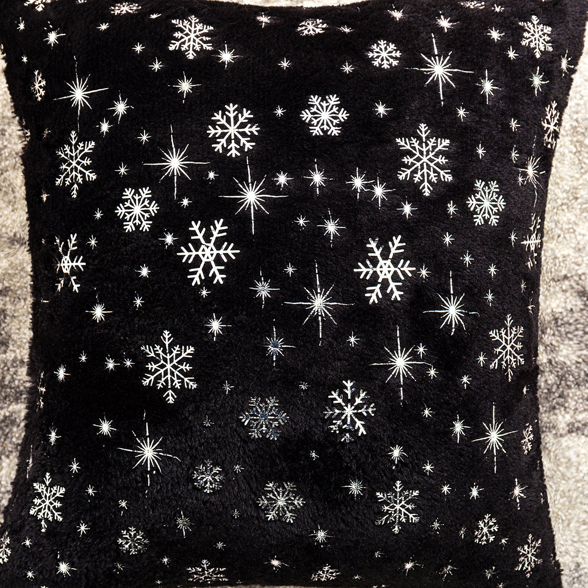 Soft plush pillowcase with snowflakes and gold embossing
