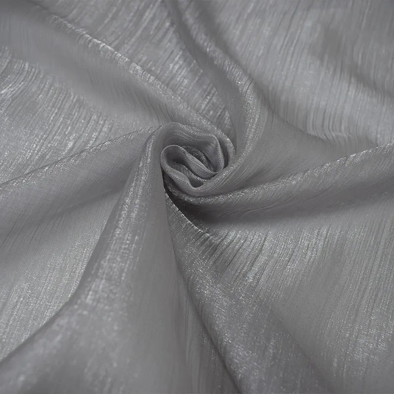 Voilage transparent à la structure fine et au jeu de lumière subtil – Avelin