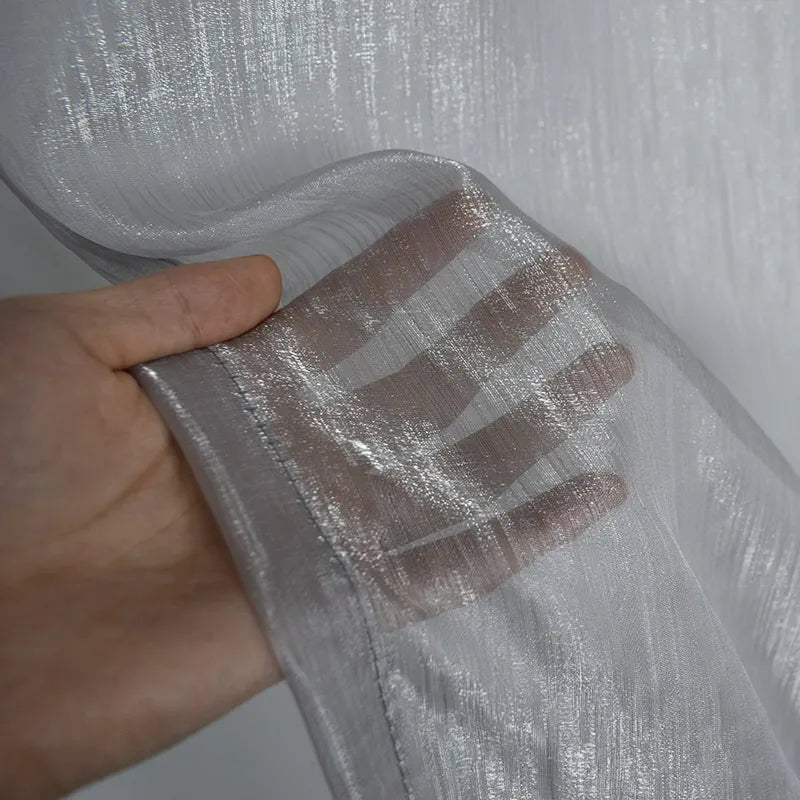 Voilage transparent à la structure fine et au jeu de lumière subtil – Avelin