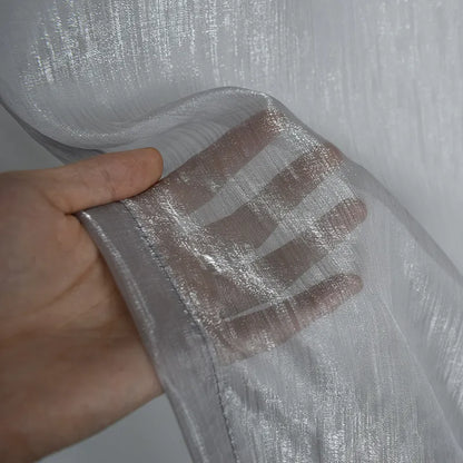 Voilage transparent à la structure fine et au jeu de lumière subtil – Avelin