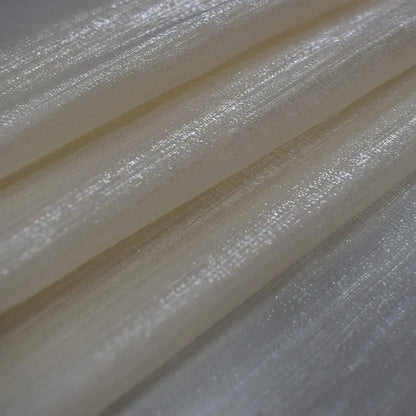 Voilage transparent à la structure fine et au jeu de lumière subtil – Avelin