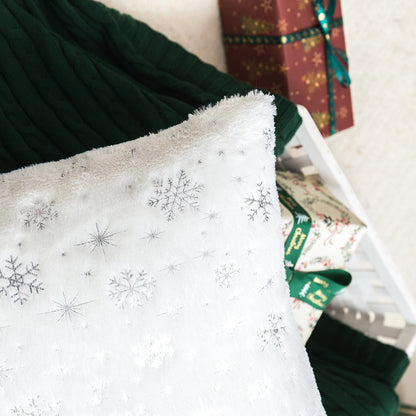 Soft plush pillowcase with snowflakes and gold embossing