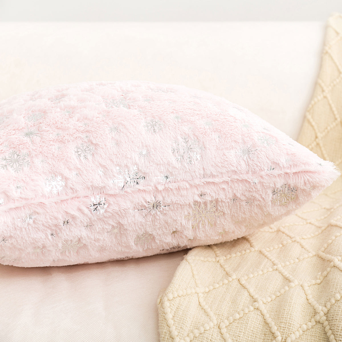 Soft plush pillowcase with snowflakes and gold embossing