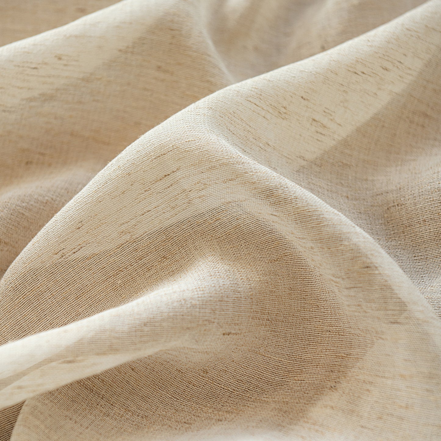 Arched cafe curtain in a linen blend with tassels in a country style