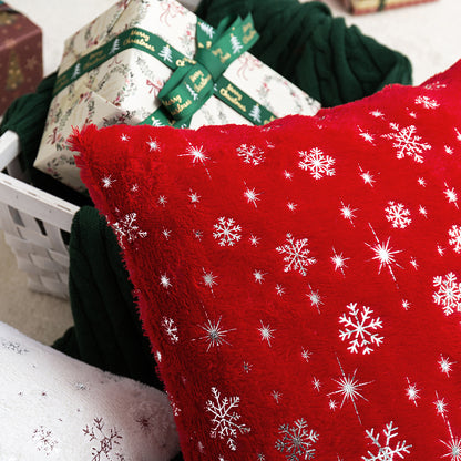 Soft plush pillowcase with snowflakes and gold embossing