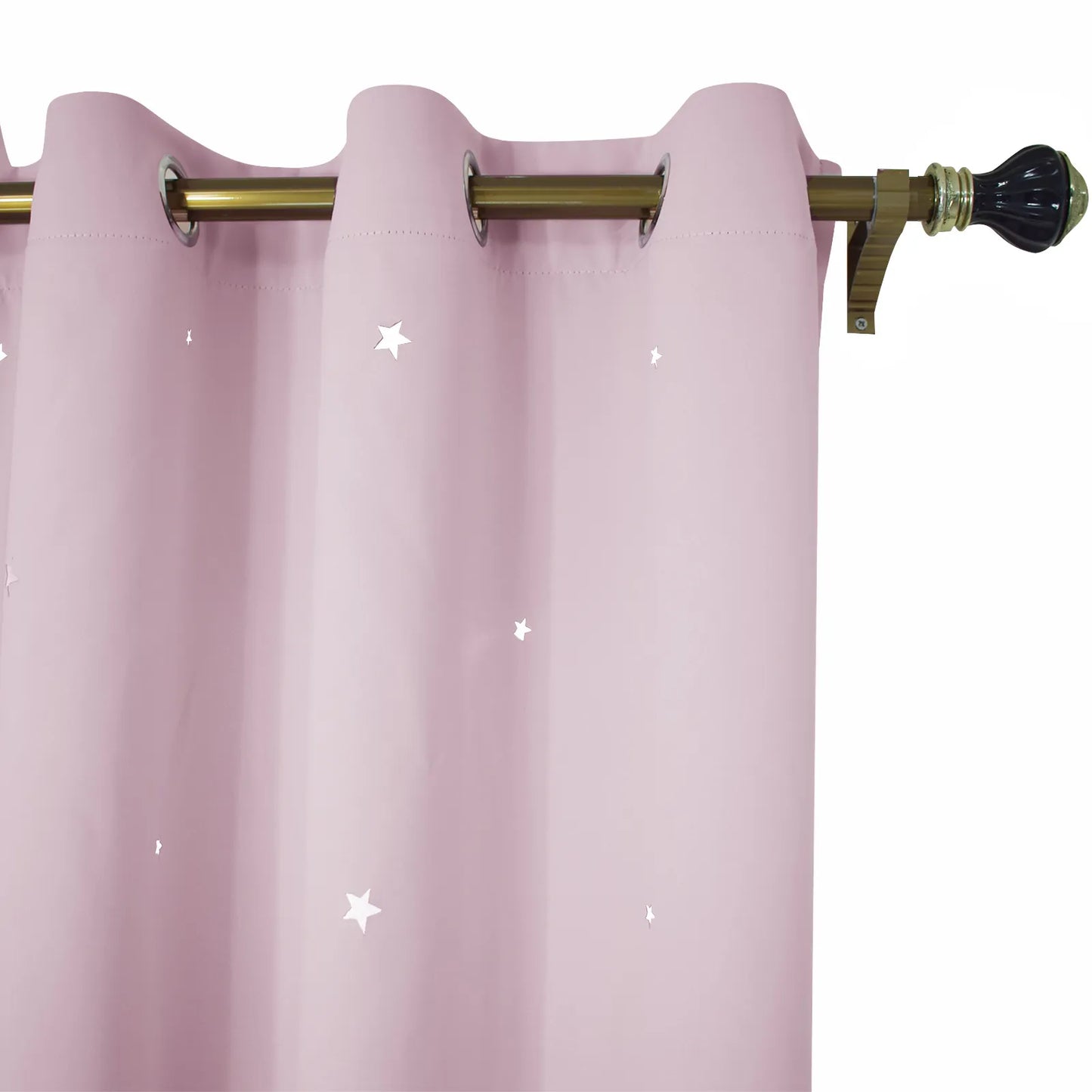 Blackout curtain with cut-out stars and overlay design