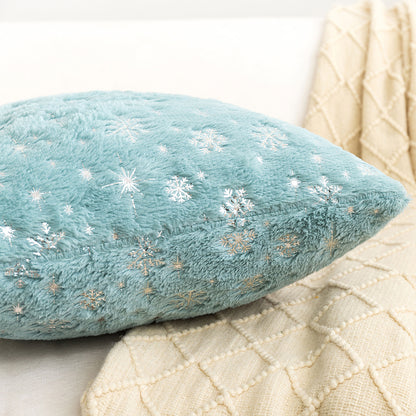 Soft plush pillowcase with snowflakes and gold embossing