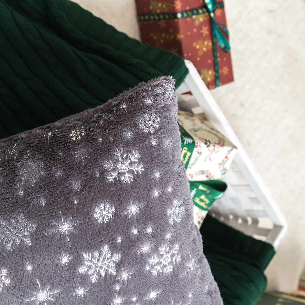 Soft plush pillowcase with snowflakes and gold embossing