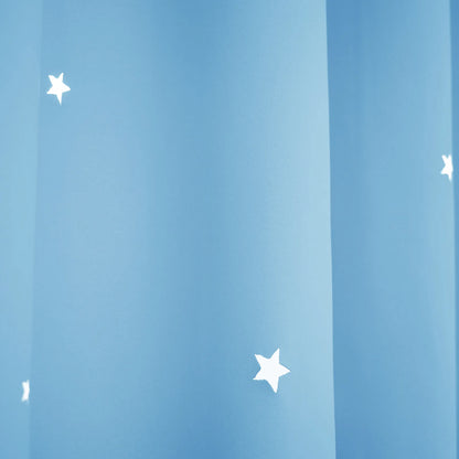 Blackout curtain with cut-out stars and overlay design
