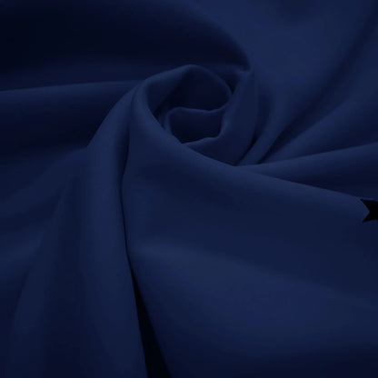 Blackout curtain with cut-out stars and overlay design